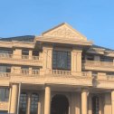 丽江黄金麻别墅外墙干挂石材效果示例