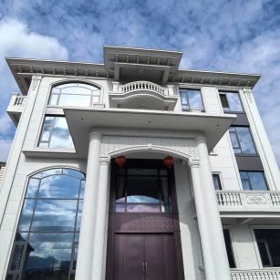 丽江白麻别墅外墙干挂石材效果示例