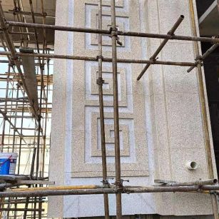 丽江 黄金麻花岗岩别墅外墙干挂回纹造型效果