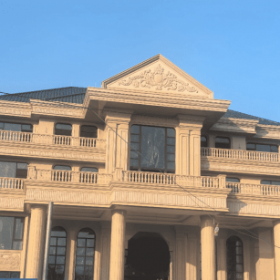 丽江黄金麻别墅外墙干挂石材效果示例