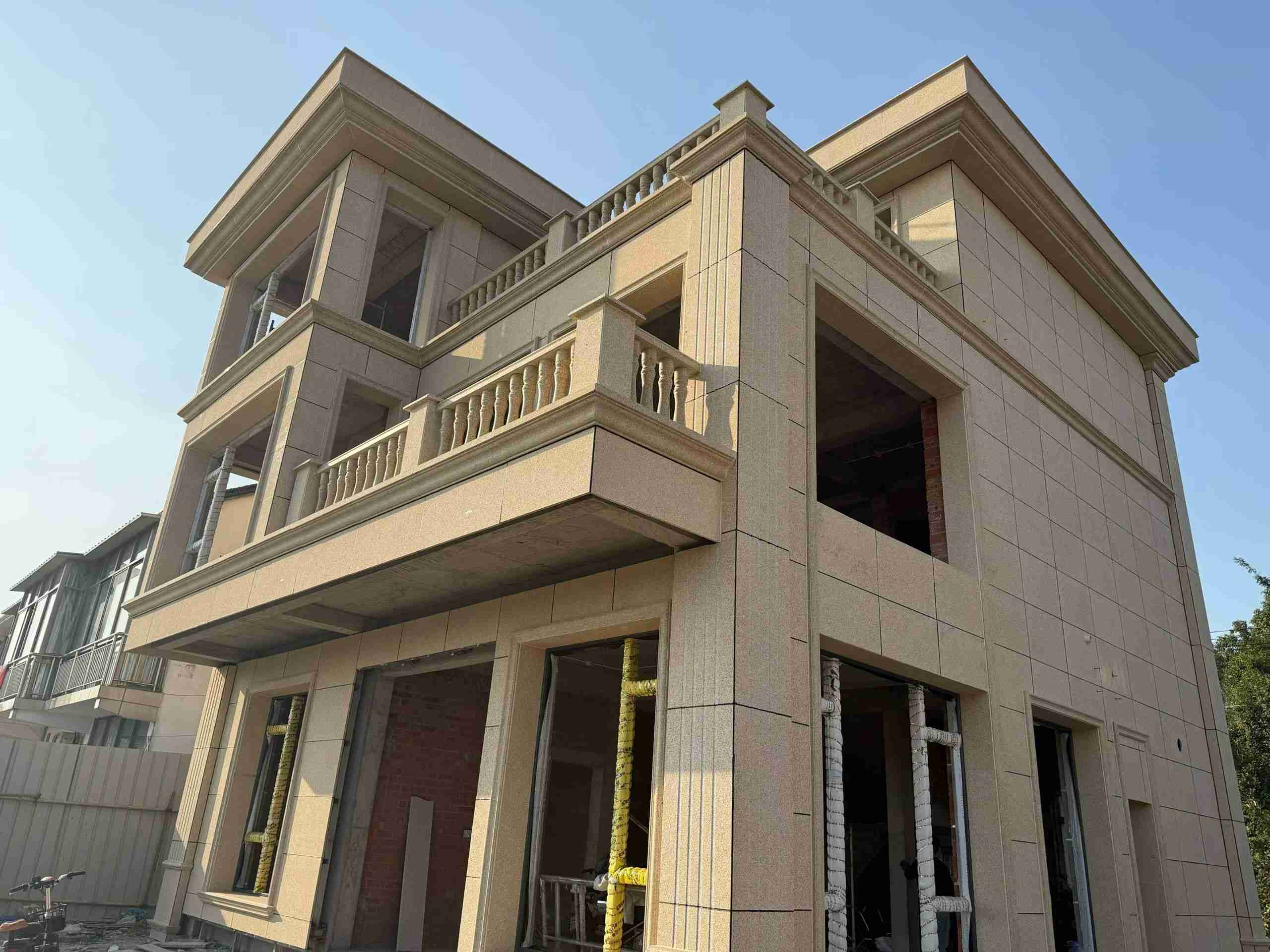 丽江 黄金麻花岗岩石材荔枝面外墙干挂效果展示